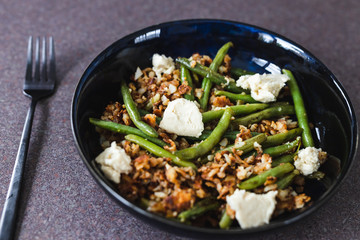 healthy plant-based food, crumbed hash brown with green beans and homemade vegan mozzarella made of cashews