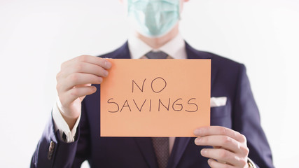 business financial concept. Covid-19 Man with medical mask with no savings left