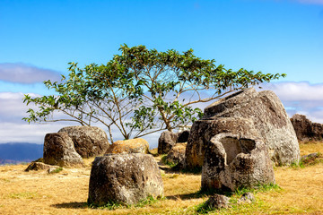 The Plain of Jars is Ancient stone a megalithic archaeological landscape in Xieng Khouang Province,...