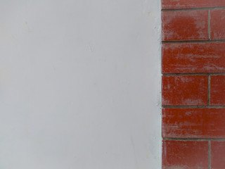 red brick pattern and white painted wall