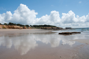 Seaside Cloud Formation & Glasslike Reflection Beach Sand