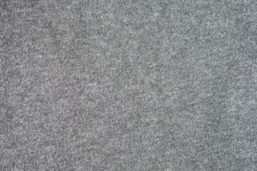 Sweater heather texture grey. synthetic fibers textile cloth abstract background. Detail soft...