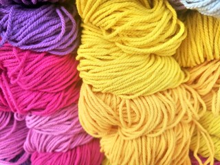 Colorful ropes sell in the market.