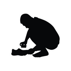Boy clean shoes silhouette