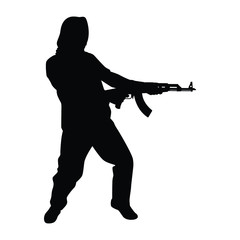 Terrorist with gun silhouette