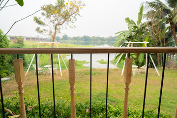 Fototapeta premium green trees nature landscape view. showing the lake and cloudy white sky