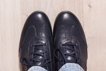 Elegant stylish navy blue shoes for men on white board