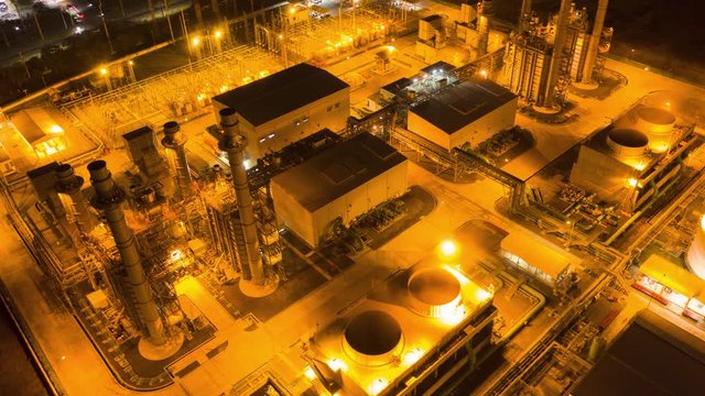 Hyperlapse Timelapse Aerial view drone night light oil refinery terminal is industrial facility for storage of oil and petrochemical. oil manufacturing products. power electric plant. footage B Roll.