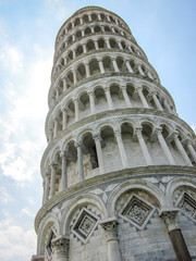 A shot of Leaning tower of Pisa with tourists