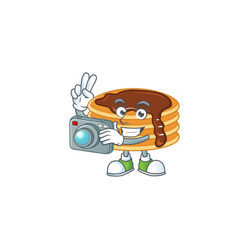Chocolate cream pancake photographer mascot design concept using an expensive camera