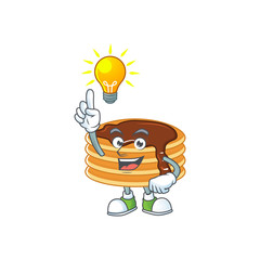 A genius chocolate cream pancake mascot character design have an idea