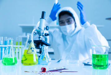 Scientist break the blood tube broken.