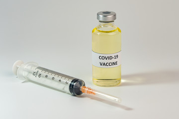 Coronavirus vaccine concept on white background with syringe injection