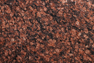 Natural granite background. stone texture for design. View from above.