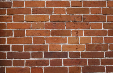 Old red brick wall. Red old brick. with white seams texture.