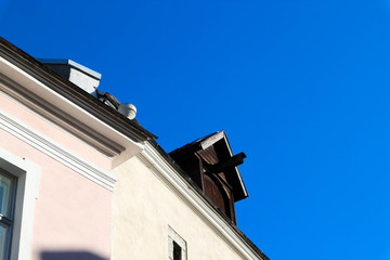 Fototapeta na wymiar medieval lifting gear on the tallinn old house roof
