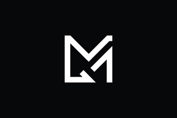 Fototapeta premium Minimal elegant monogram art logo. Outstanding professional trendy awesome artistic MG GM initial based Alphabet icon logo. Premium Business logo White color on black background