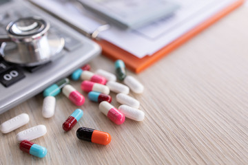 Drug calculations,drug with colorful pills and blue background,drug,Prescription,Pills with stethoscope,pharmacy
