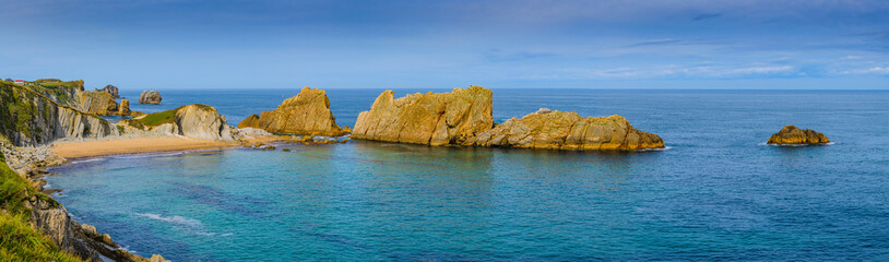 Panorama of the amazing coast with incredible cliffs. Cantabria. Northern coast of Spain