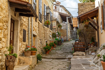 HUM / CROATIA - AUGUST 2015: Street in the centre of the small medieval Hum town, Istria, Croatia