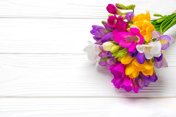 Bouquet of sprig freesia flowers isolated on white background Floral holiday card Top view Flat lay