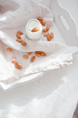 Homemade almond milk in a small bottle