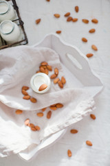 Homemade almond milk in a small bottle