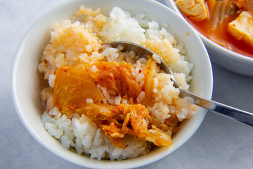 Korean Tuna kimchi stew which is called Chamchi Kimchi Jjigae with rice