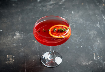 Blood oranges margarita on the rustic background. Selective focus. Shallow depth of field.