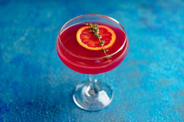 Blood oranges margarita on the rustic background. Selective focus. Shallow depth of field.