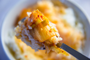 Korean Tuna kimchi stew which is called Chamchi Kimchi Jjigae with rice