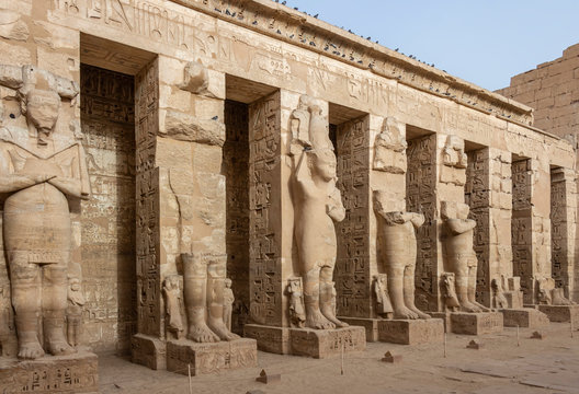 Ramessid statues in the first courtyard of the Mortuary Temple of Ramesses III