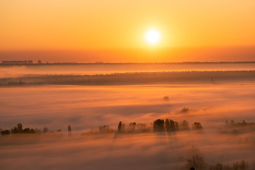 Fototapeta na wymiar Fog on sunrise