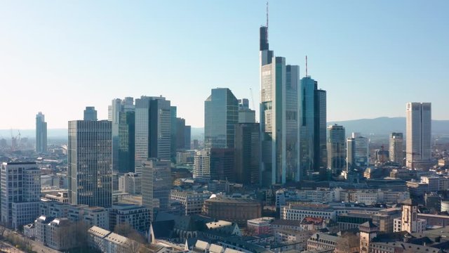 Cinematic panorama  rotating aerial drone shot of the skyline and skyscrapers of frankfurt am main 4K 30p