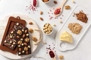 Raw Vegan Handmade Chocolate with nuts and dried fruits. Chocolate bars and organic ingredients:...