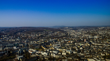 Aerial view of the new university building for business since and the upper town of Siegen city