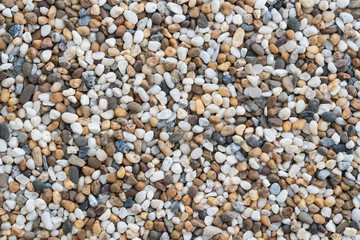 Flat lay of sea stones texture background. Abstract shape pattern from nature.