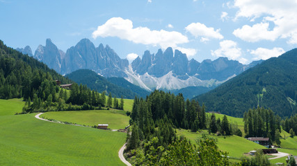 Santa Maddalena and dolomite rocks on a sunny day in Italy