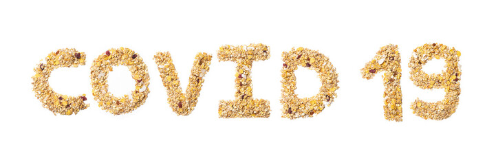 Inscription Covid 19 of the English alphabet from muesli with coconut, berries, raisins, cereal and natural cereals on a white isolated background.Sign  coronavirus from a photo of granola