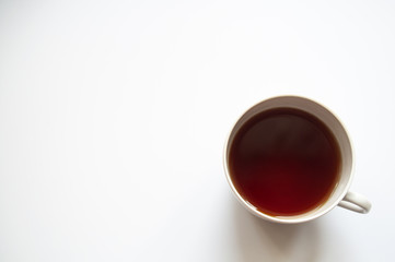 white coffee mug isolated on a white background top view