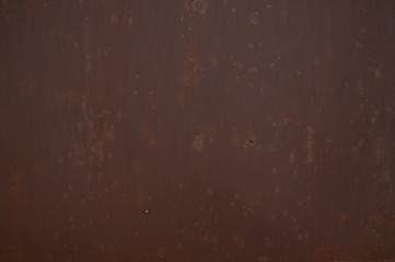 the texture of the iron sheet wall is dark