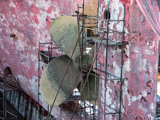 Old tanker`s propeller, screw. Dock
