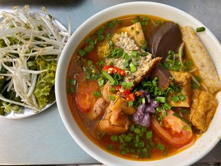 Vietnam traditional street food bun rieu cua crab rice noodle soup bowl