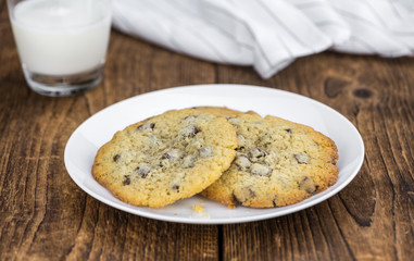 Chocolate Chip Cookies (fresh made) as detailed close-up shot; selective focus