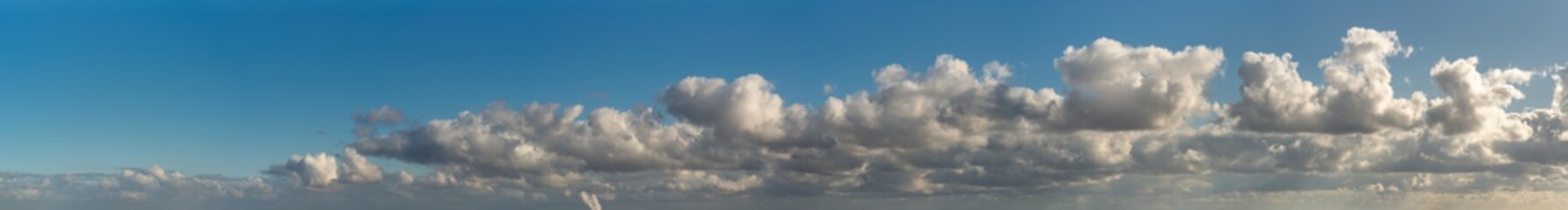 Naklejka na ściany i meble Fantastic soft clouds against blue sky, natural composition
