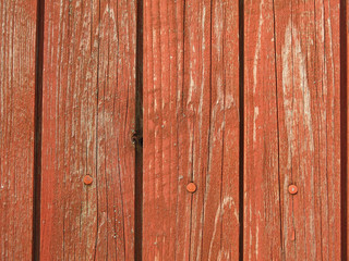 old peeling boards with peeling brown paint for the background