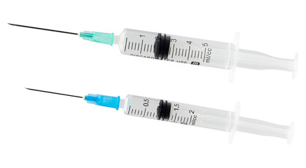 Medical syringe with injection solution on white background. Syringe with vaccination.