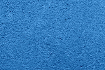 Abstract vintage retro wall toned in blue.