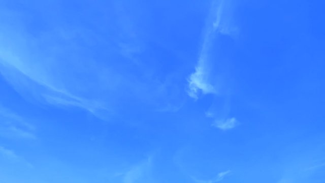 Beautiful white puffy & fluffy cirrus & cumulus clouds on tropical summer or spring bright blue sky background in sunny day TimpLapse for transitional & meditative motion vdo or nature related project