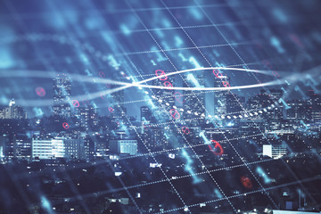 Fototapeta premium Financial graph on night city scape with tall buildings background multi exposure. Analysis concept.